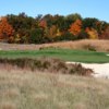 A fall day view of a well protected green at Forest Dunes Golf Club.